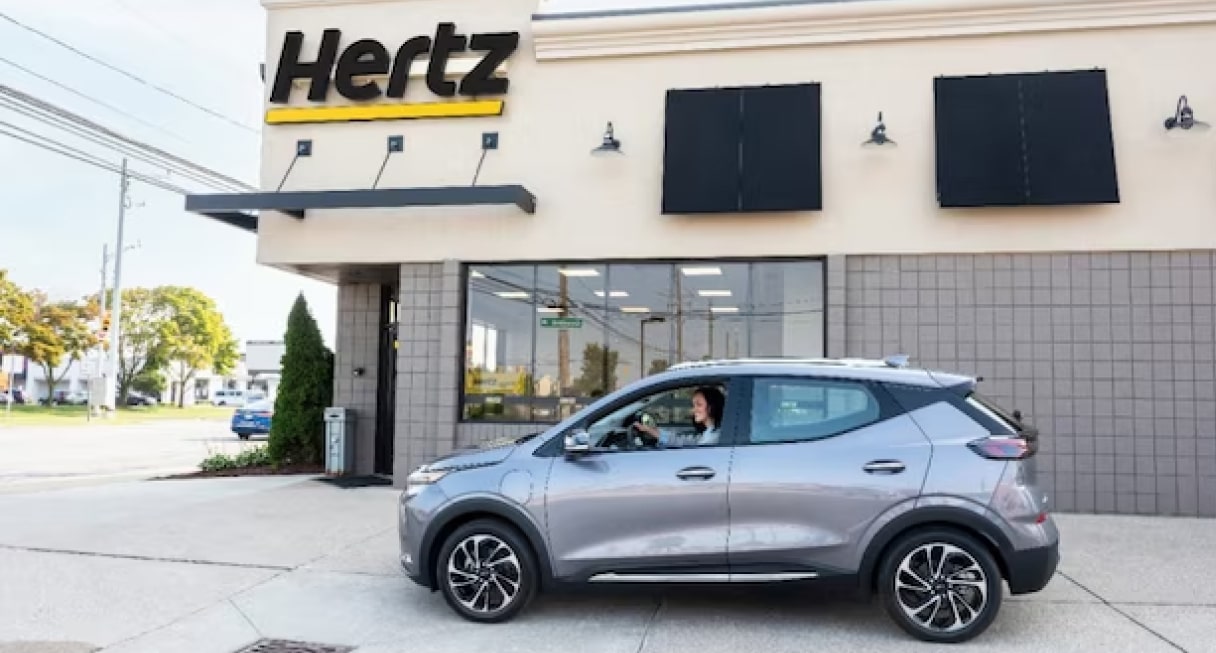 An EV in front of a Hertz location